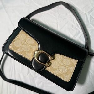 Elegant Black and Cream Crossbody Bag